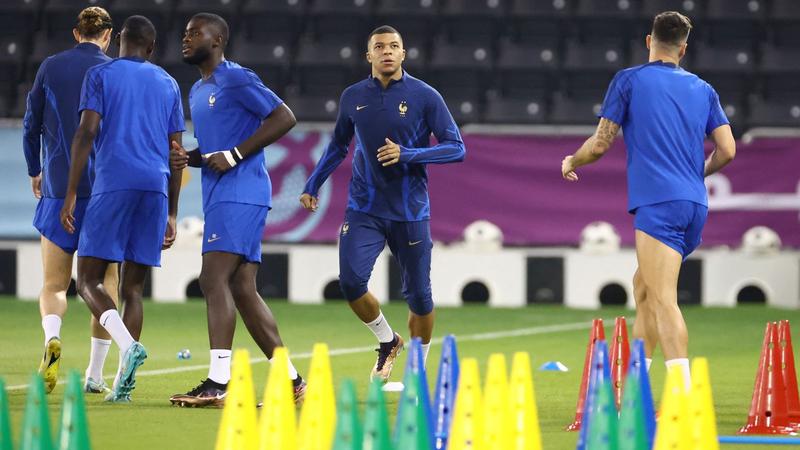 Entire France squad trains on eve of World Cup final despite virus