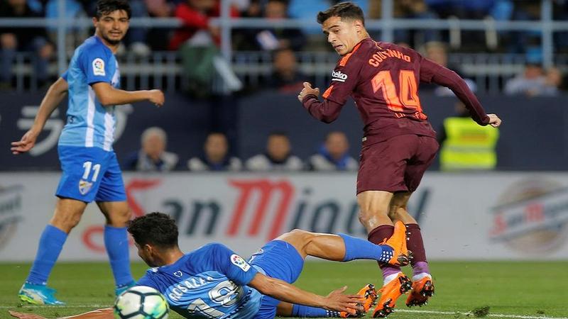 برشلونة دون ميسي يفوز في أرض ملقا