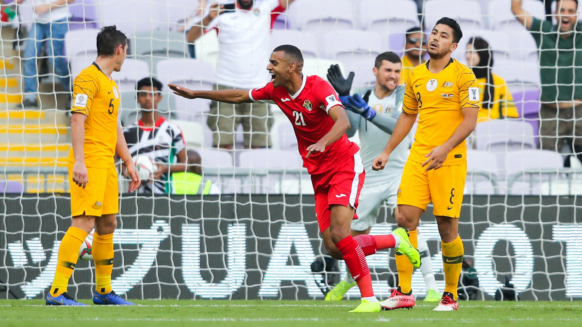 Socceroos stunned in Group B opener