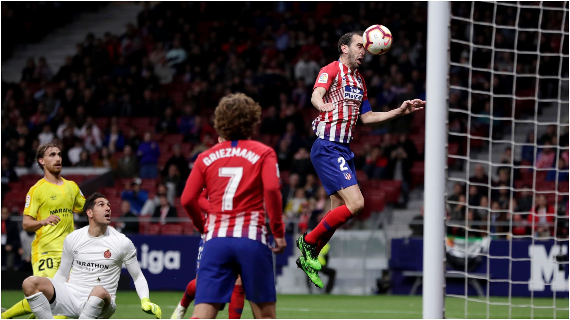 Atletico Madrid 2 Girona 0: Godin & Griezmann keep hosts in hunt