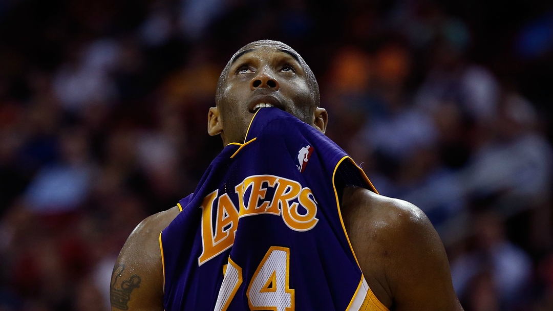 Kobe biting hot sale his shirt