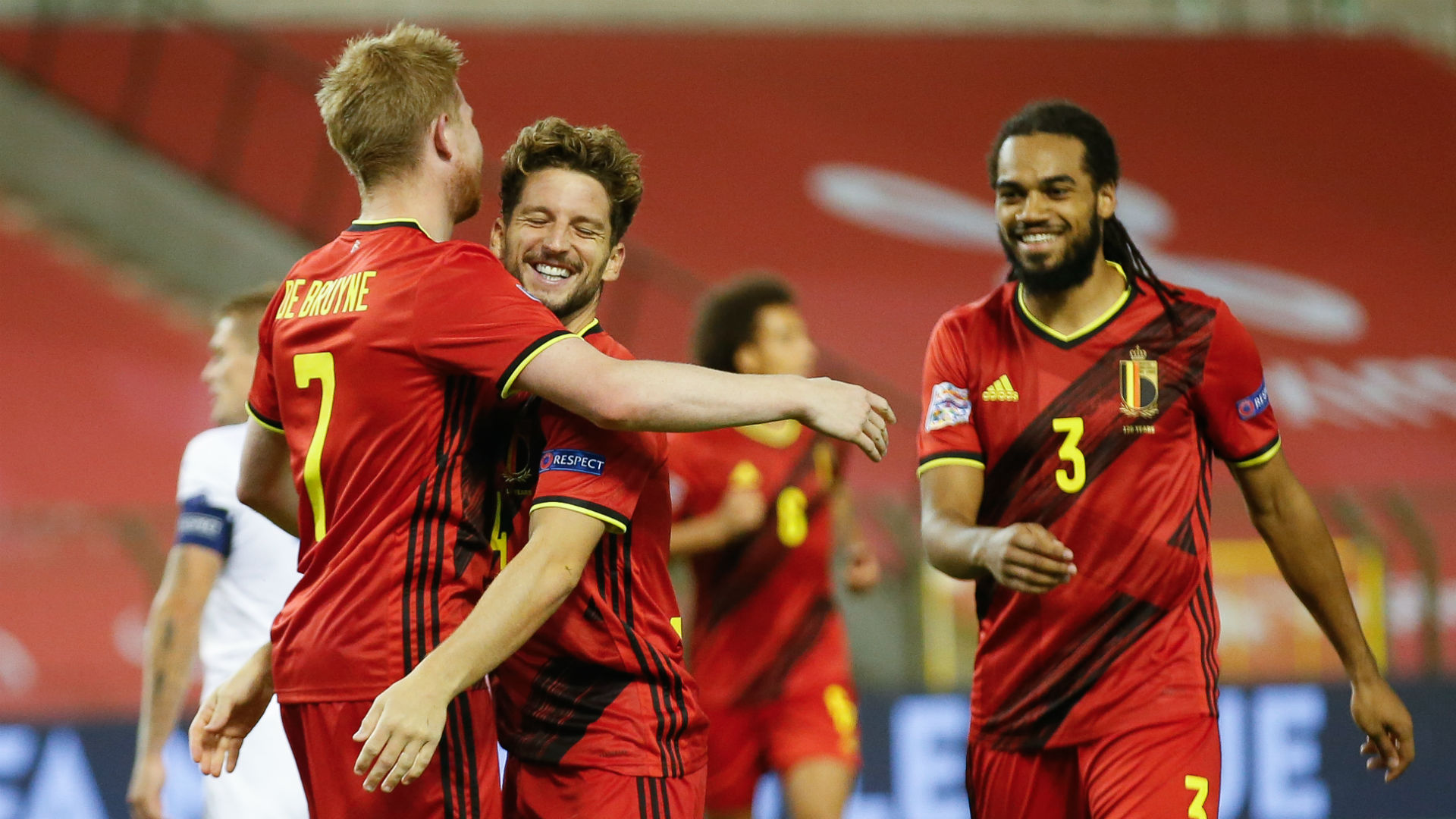 Belgium batters Iceland to go top of group