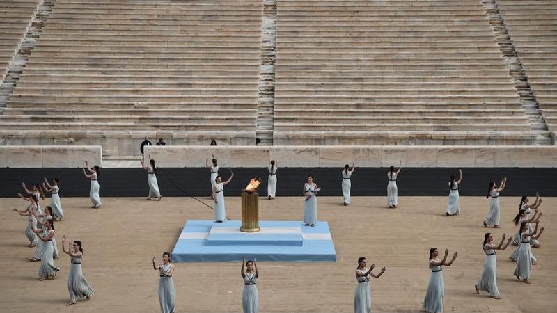 Greece hands over Olympic flame to Beijing 2022 hosts