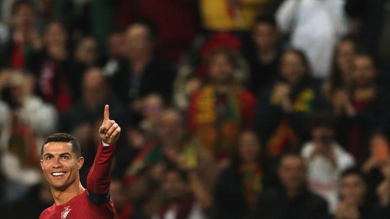Ronaldo breaks men's international caps record, scores double