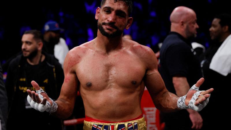 Ex-world champion Khan handed two-year ban for doping