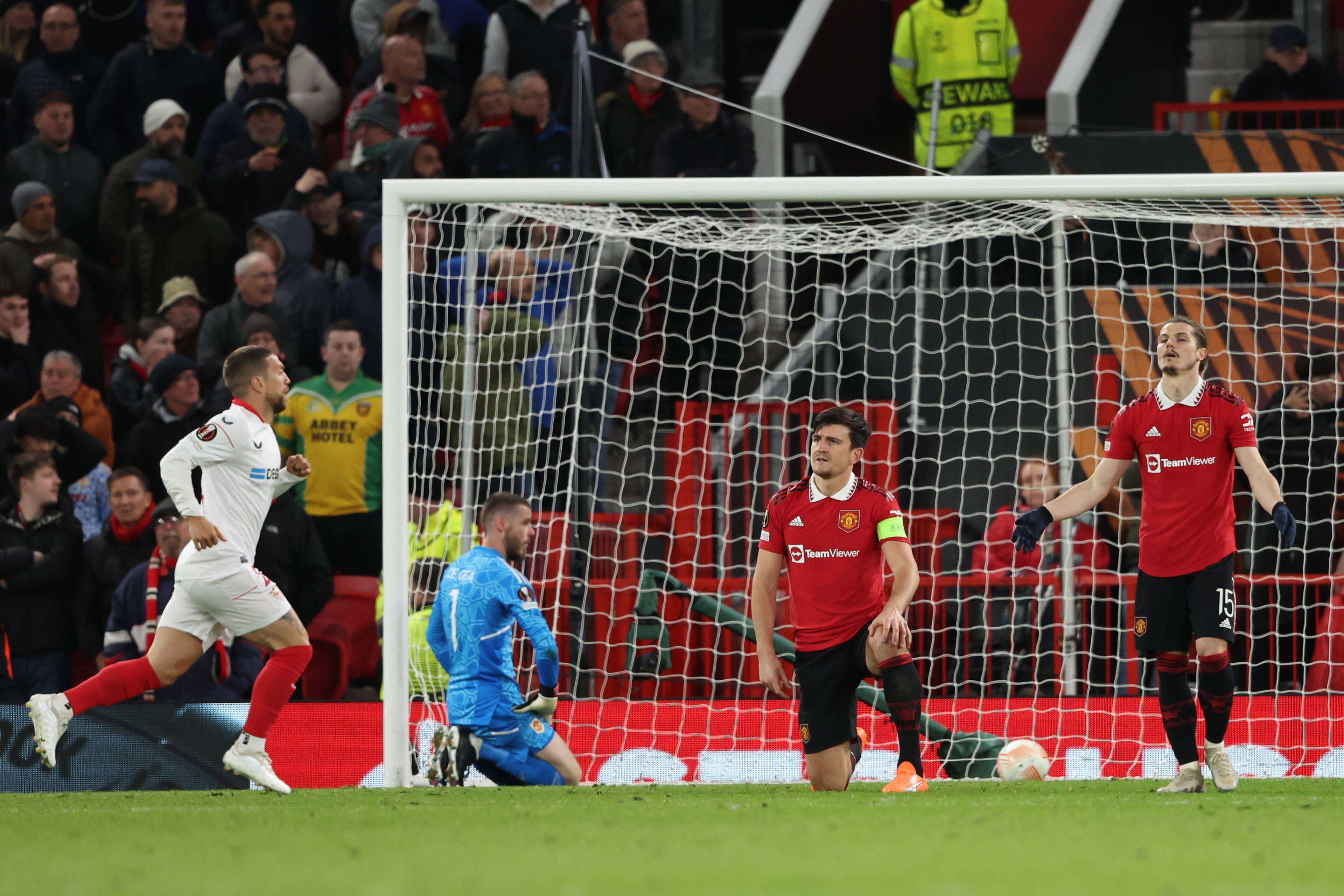United crumbles after late Maguire, Malacia own goals