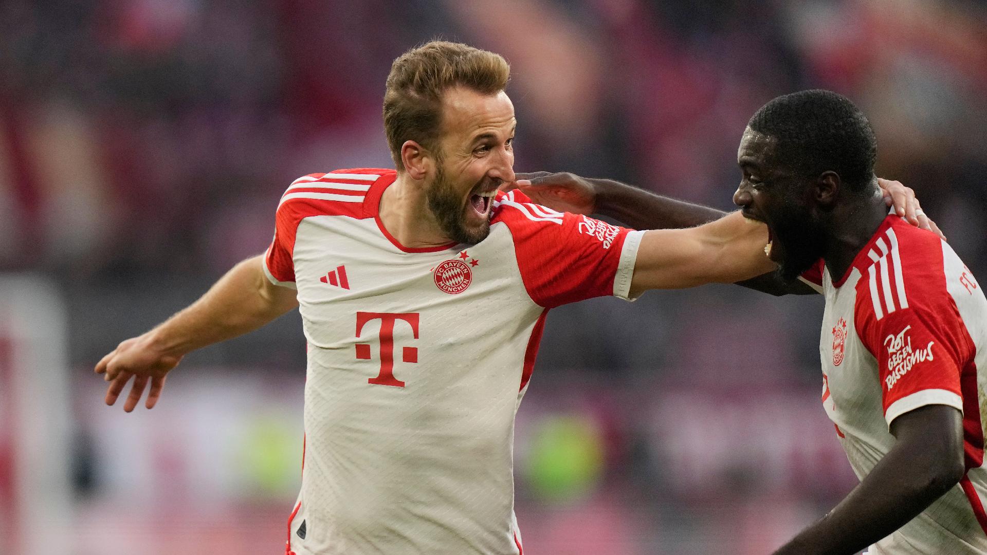 Record-breaking Harry Kane helps fire Bayern Munich to top of