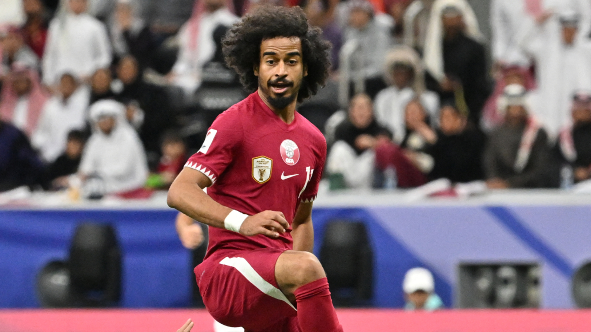 Hosts Qatar reach last 16