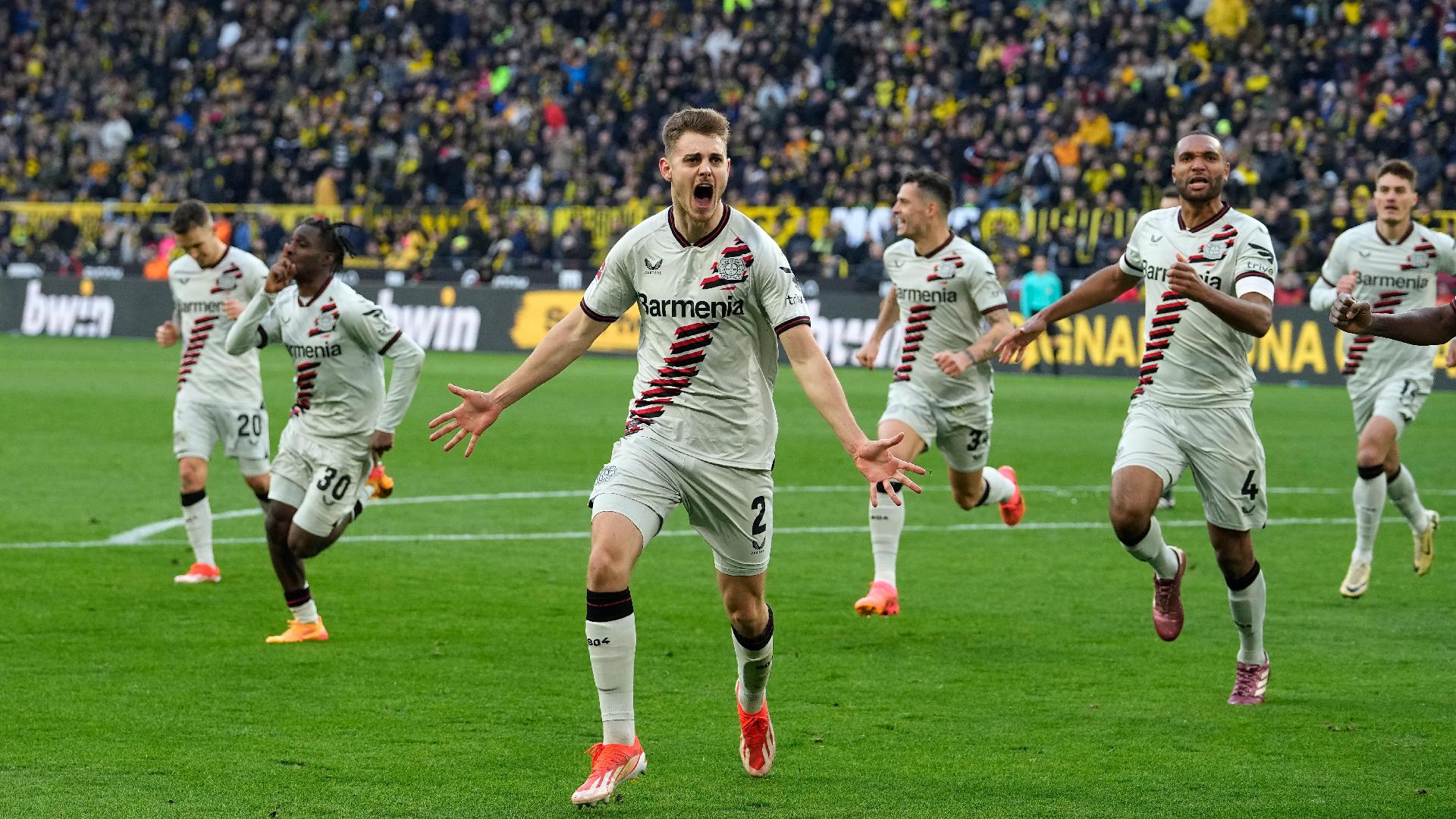 Josip Stanisic extends Bayer Leverkusen unbeaten run with late goal at Dortmund