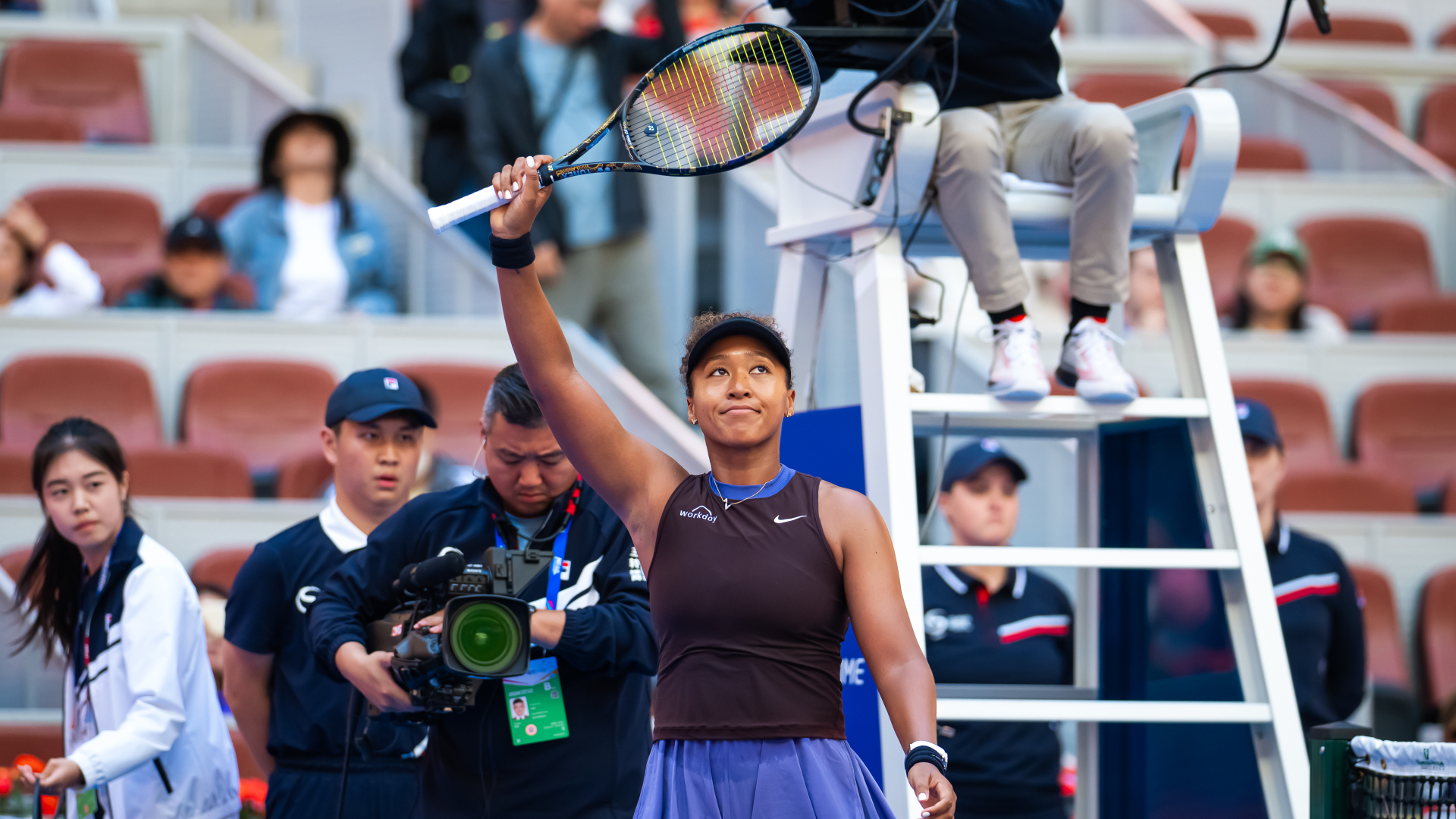 Osaka advances in Beijing