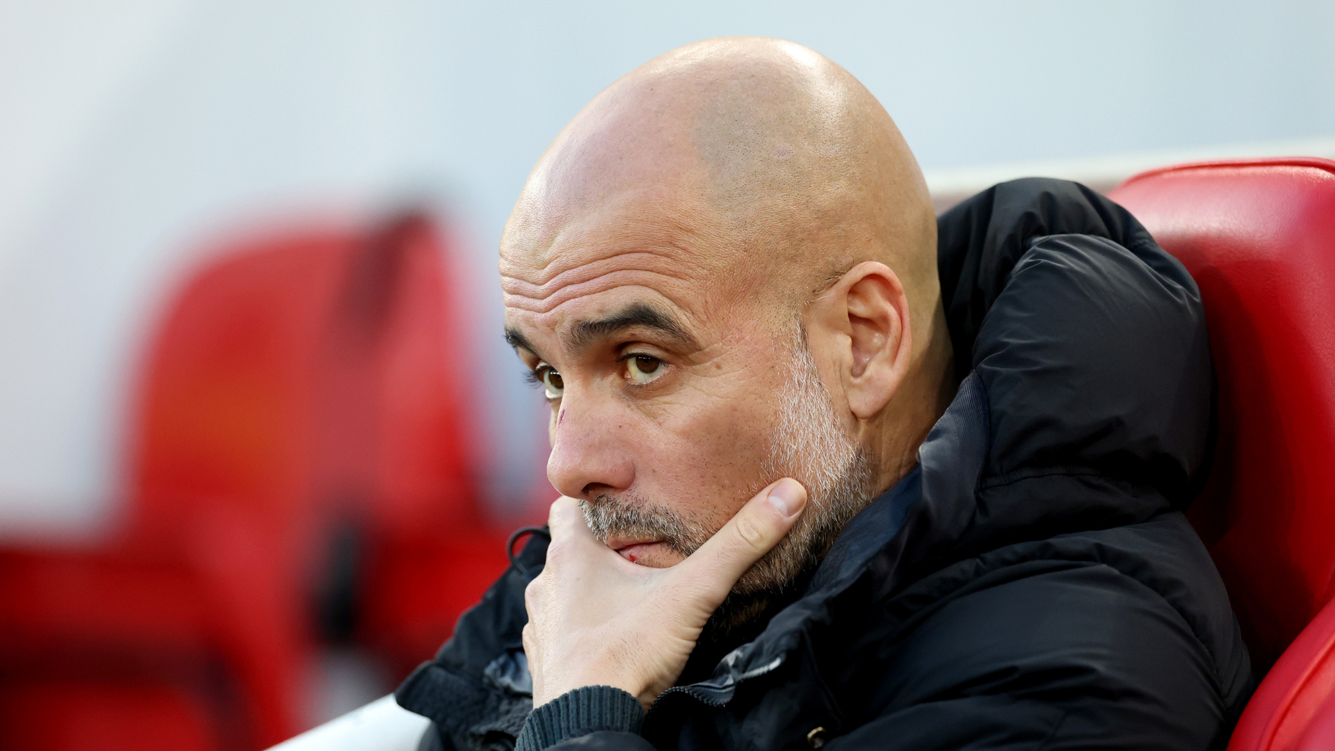 Guardiola plays down title talk