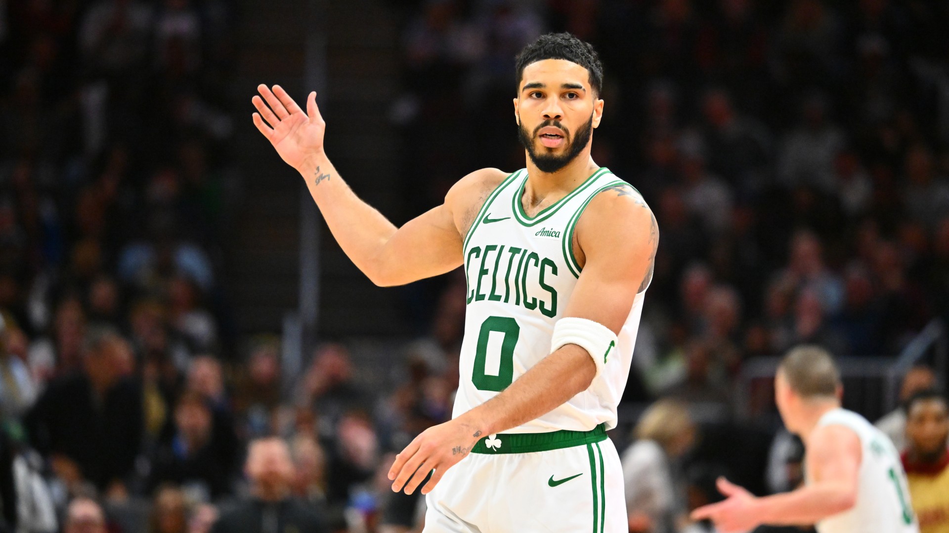 Tatum helps Celtics hold off Bucks