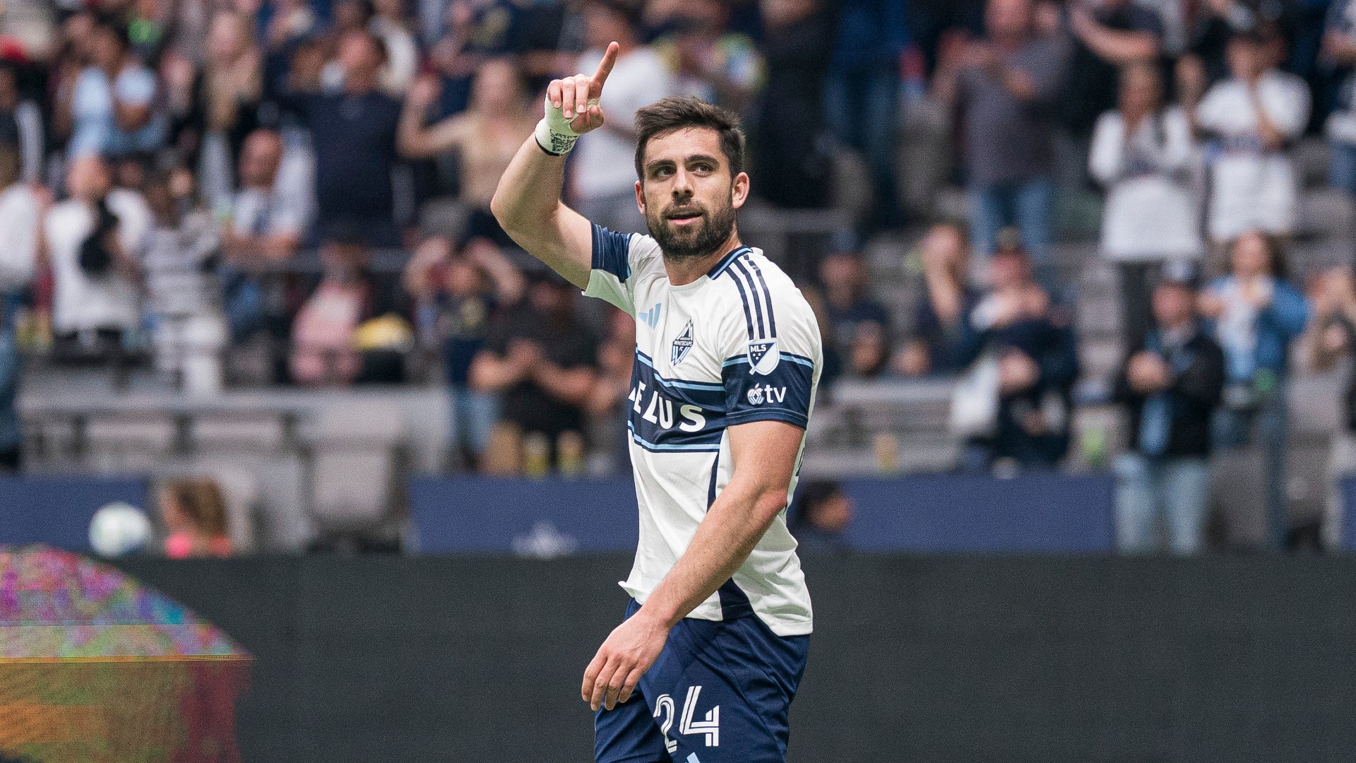 White helps Vancouver to 2-2 draw