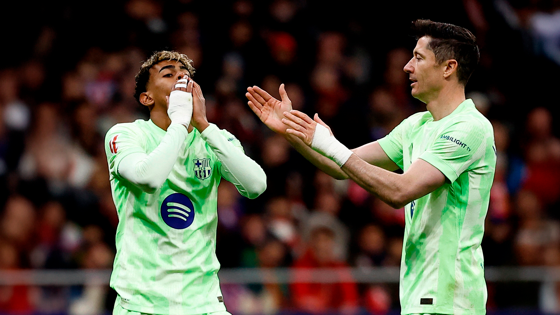 Lamine Yamal y Robert Lewandowski