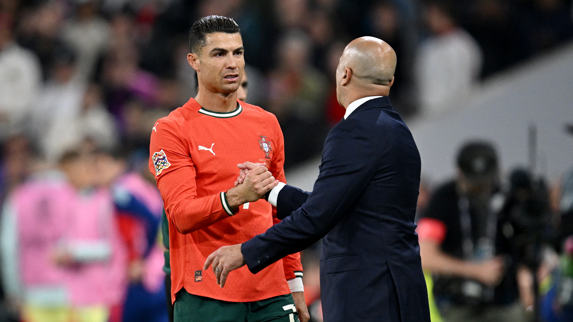 Cristiano Ronaldo y Roberto Martínez