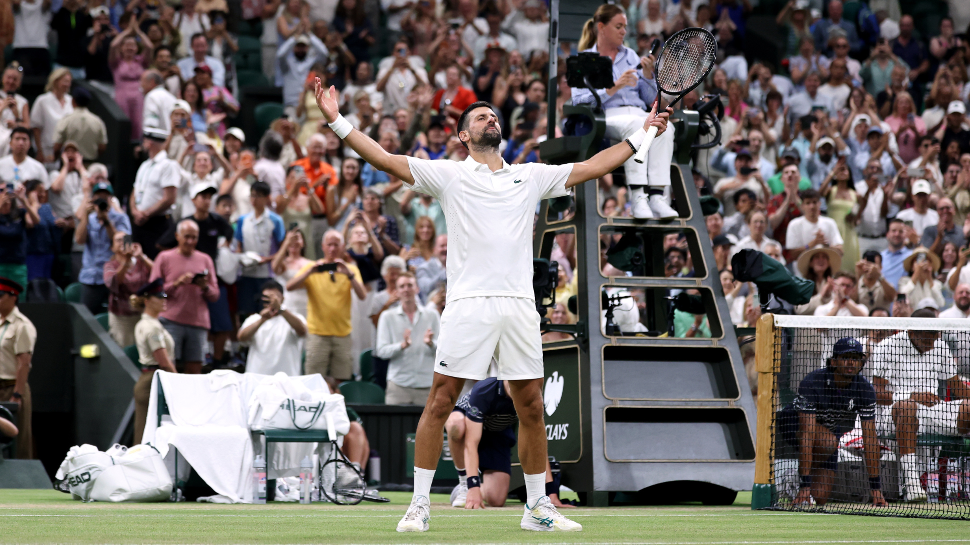 Djokovic into Wimbledon semi-finals