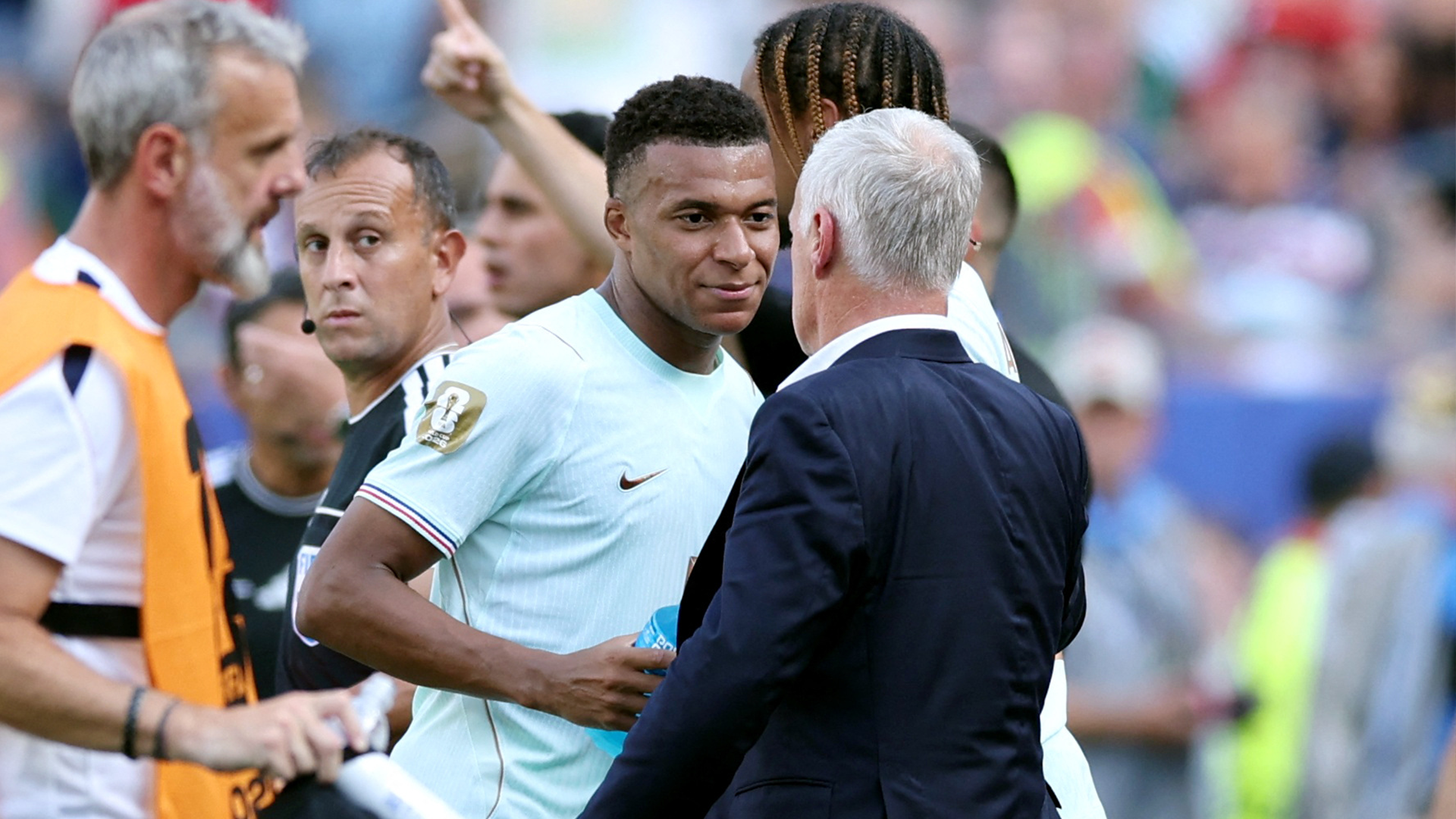 Kylian Mbappé y Didier Deschamps