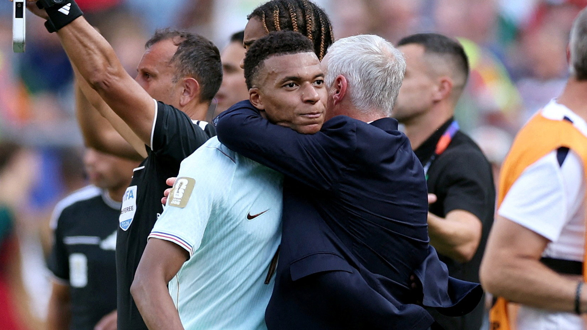 Kylian Mbappé y Didier Deschamps