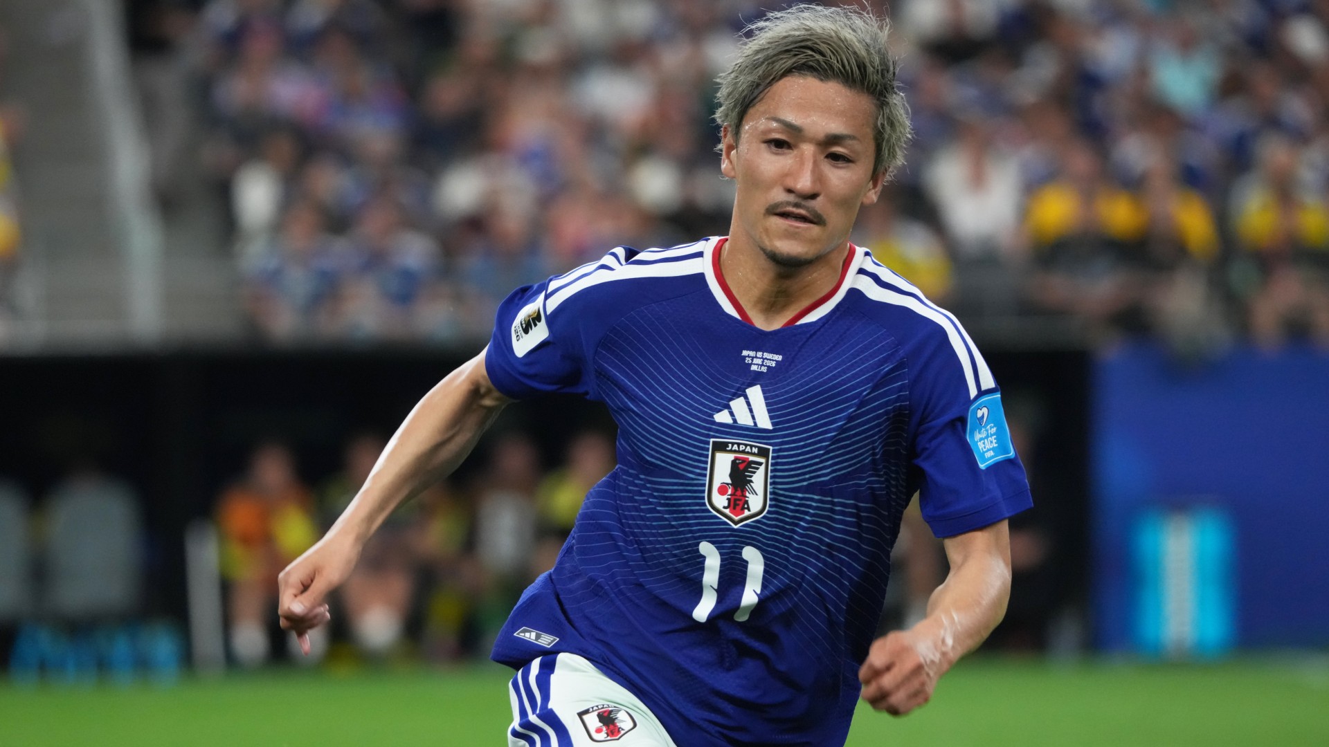 Ipswich sign Maeda