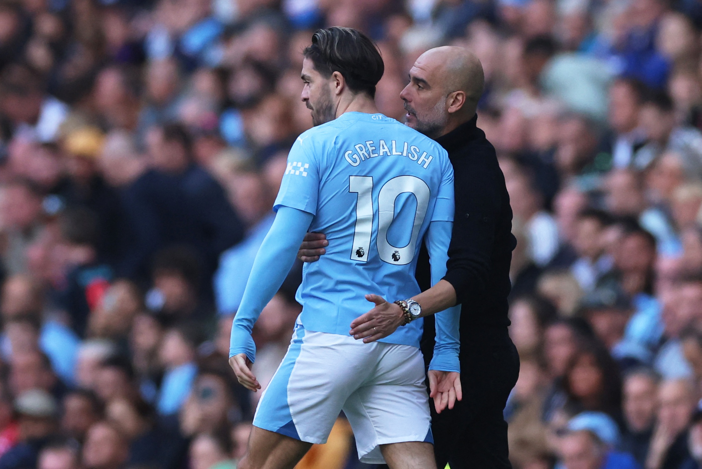 Jack Grealish et Pep Guardiola