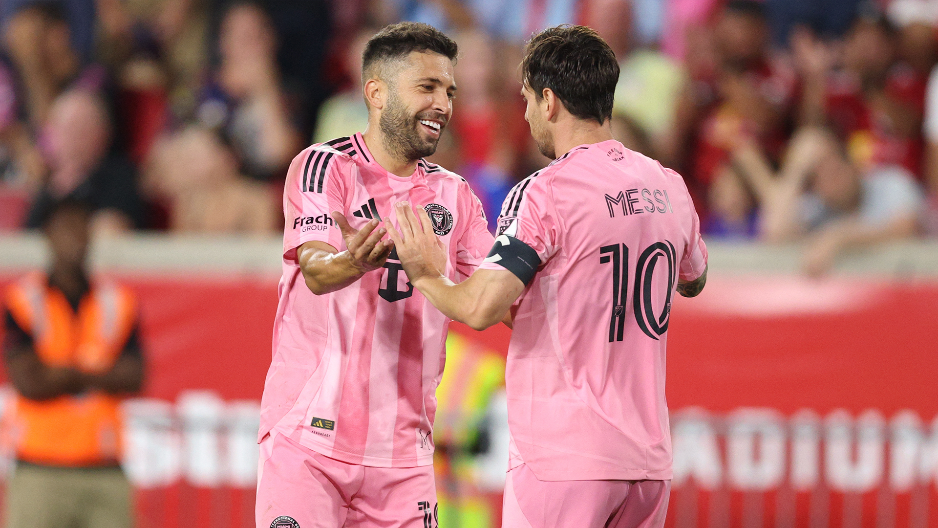 Jordi Alba y Lionel Messi