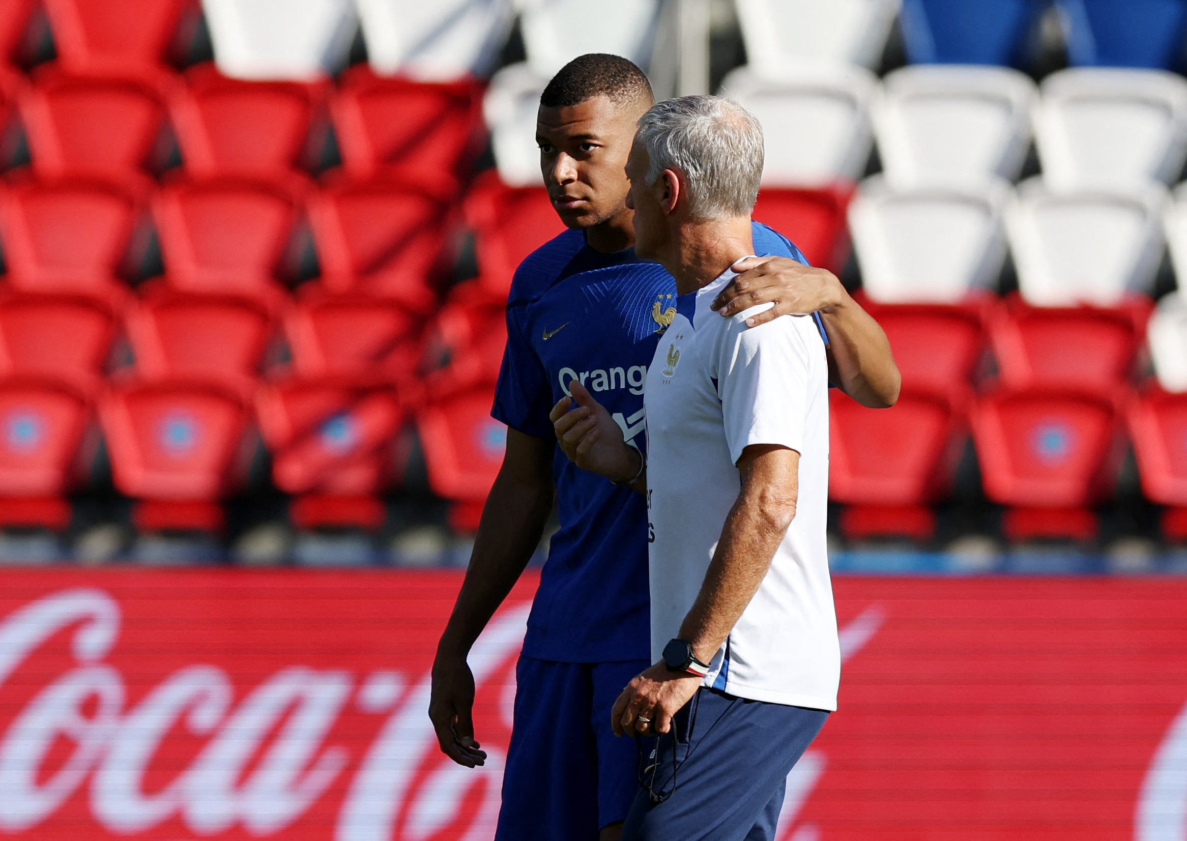 Kylian Mbappé y Didier Deschamps