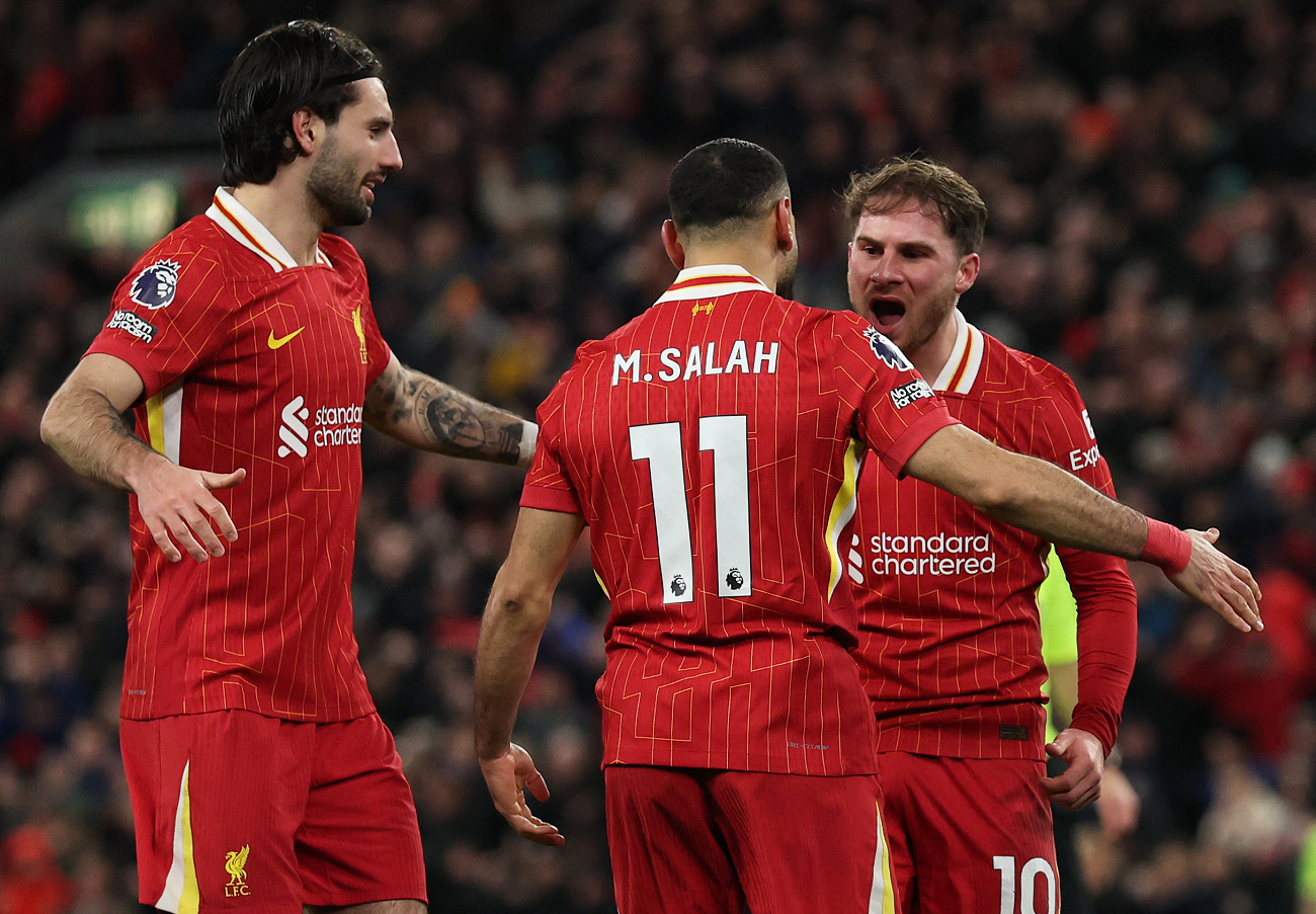 Mac Allister celebrates with Salah