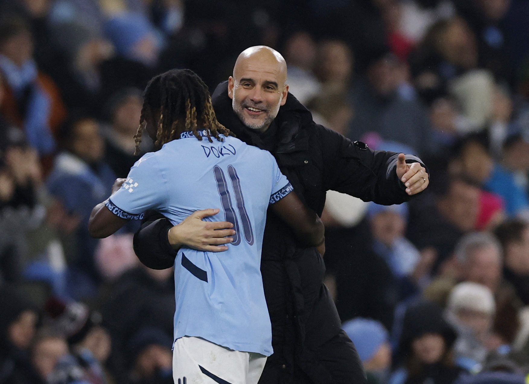 Pep Guardiola enlace Jérémy Doku