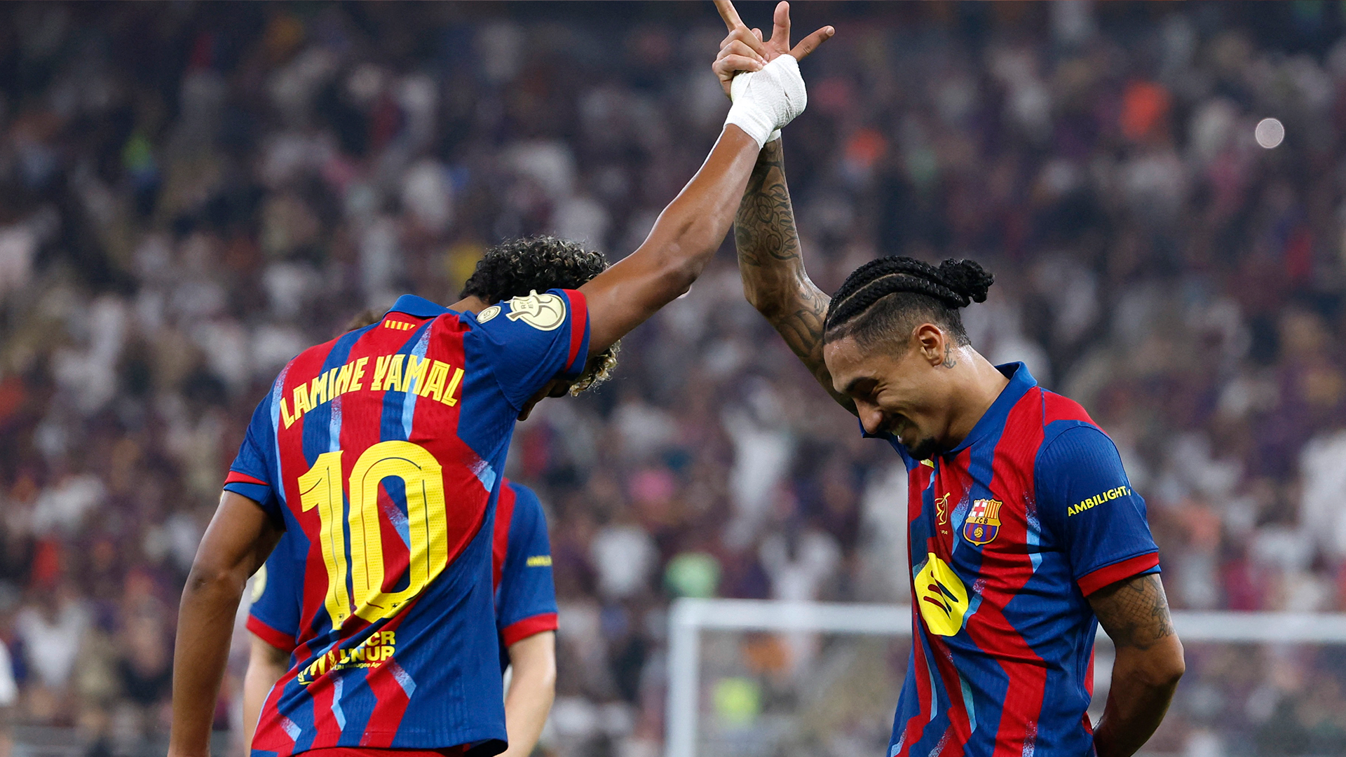 Raphinha y Lamine Yamal