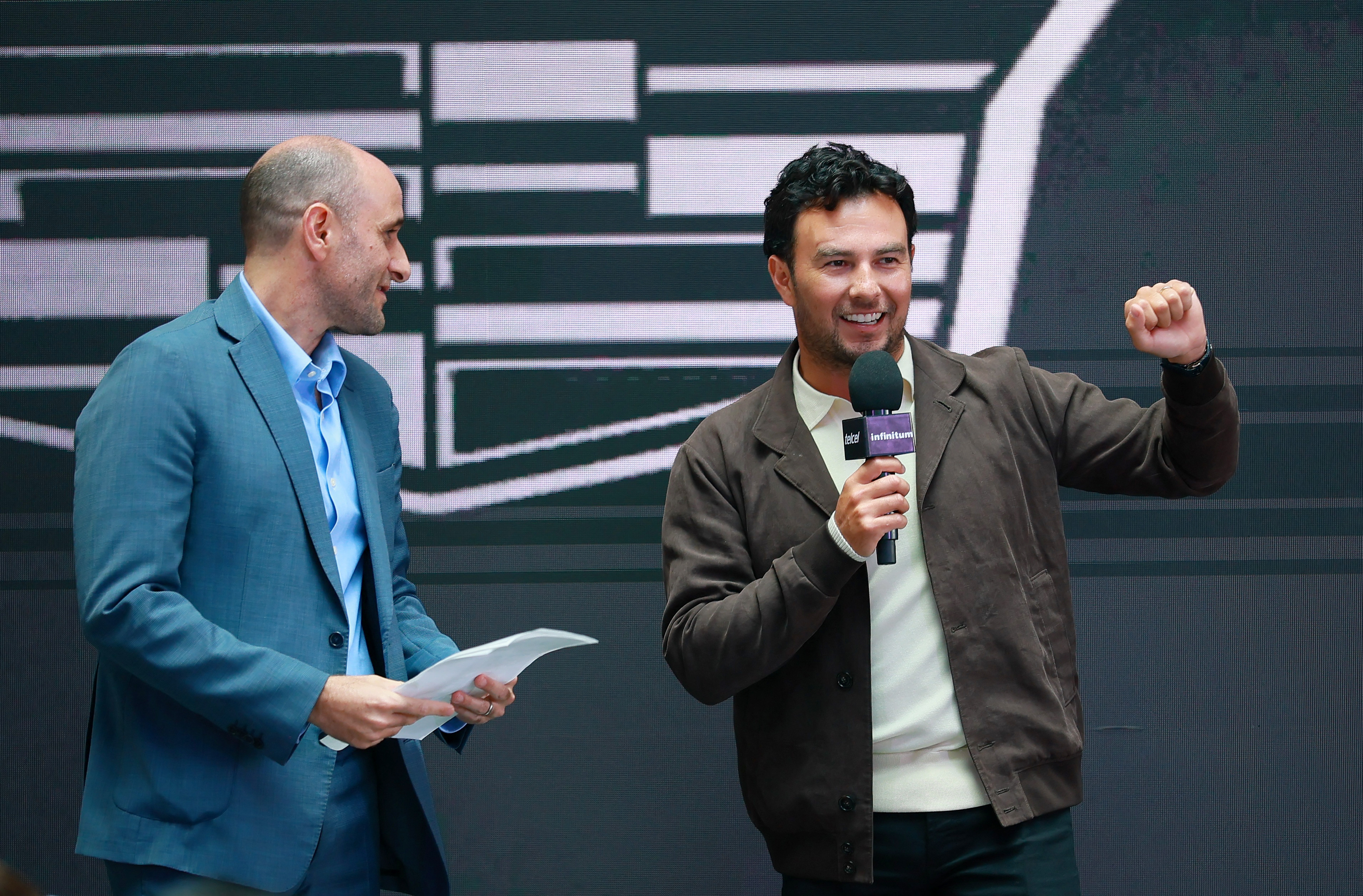 Sergio Perez with presenter Alberto Lati