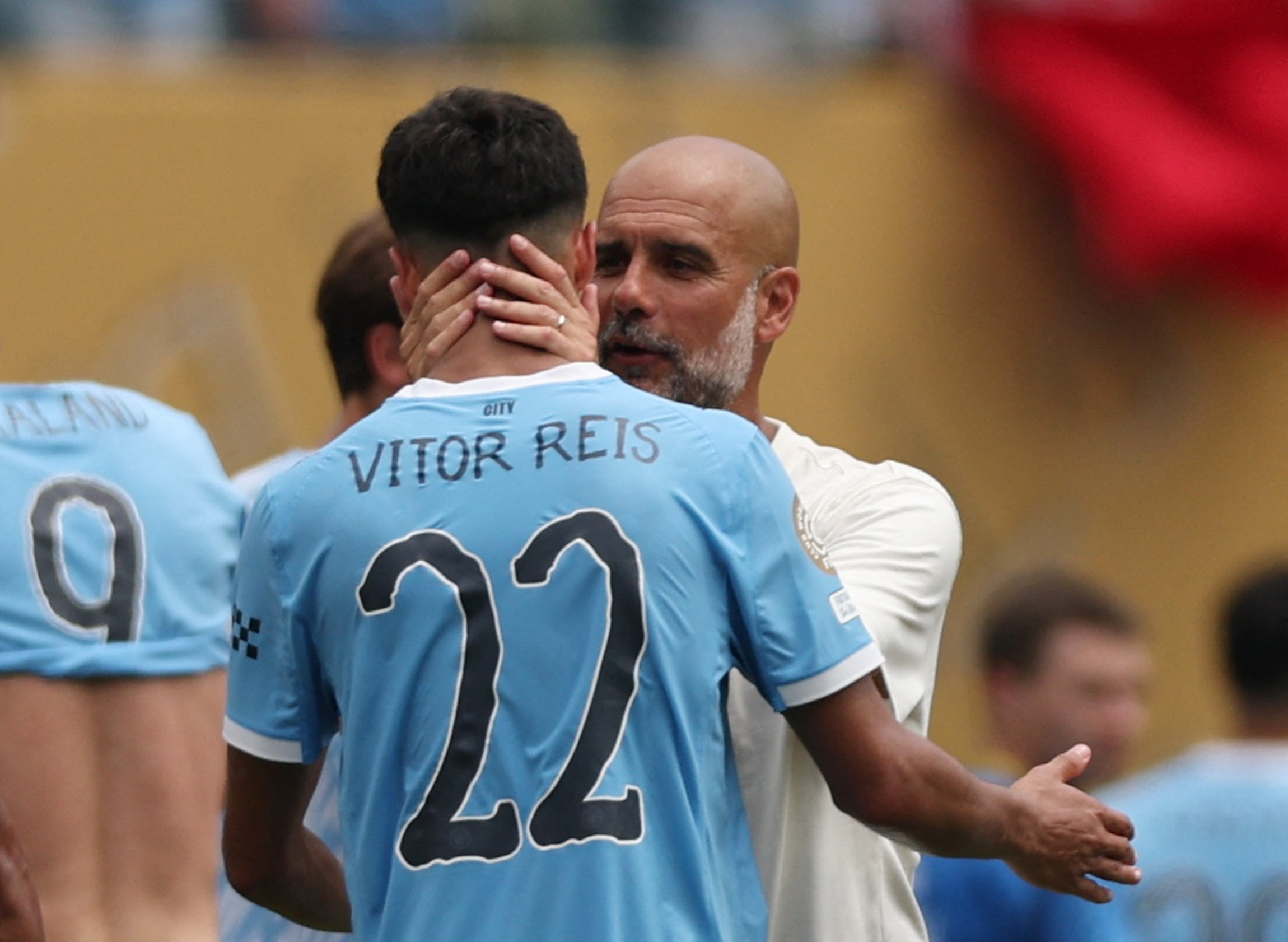 Vitor Reis et Pep Guardiola