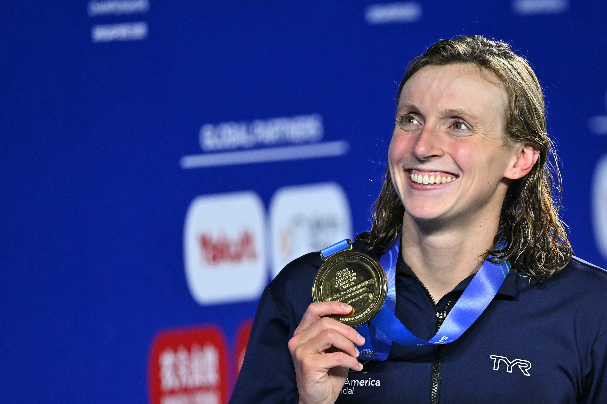swimmer Katie Ledecky celebrates